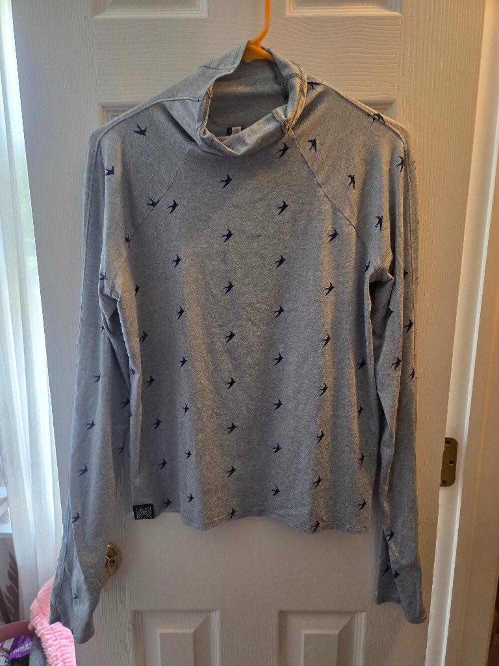 Oiselle blue lux mock neck with bird design- small